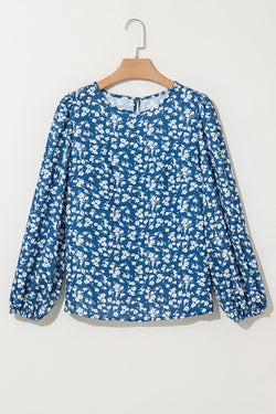 Blue blouse with small flowers and lantern sleeves