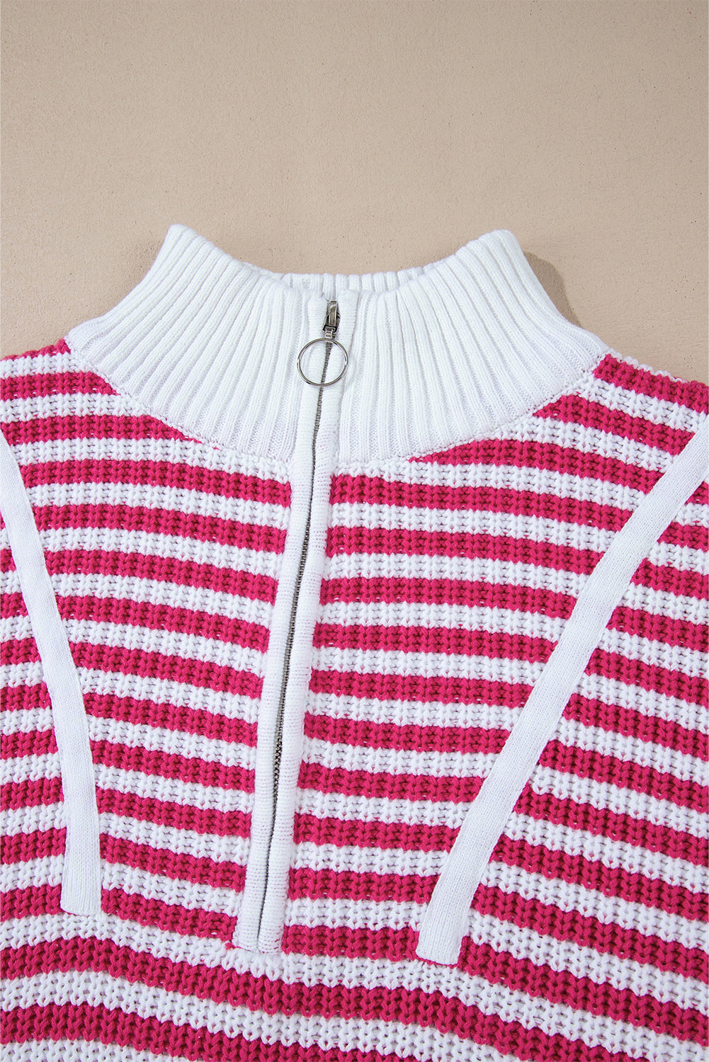 Pink striped sweater, zipped collar, dropped shoulders