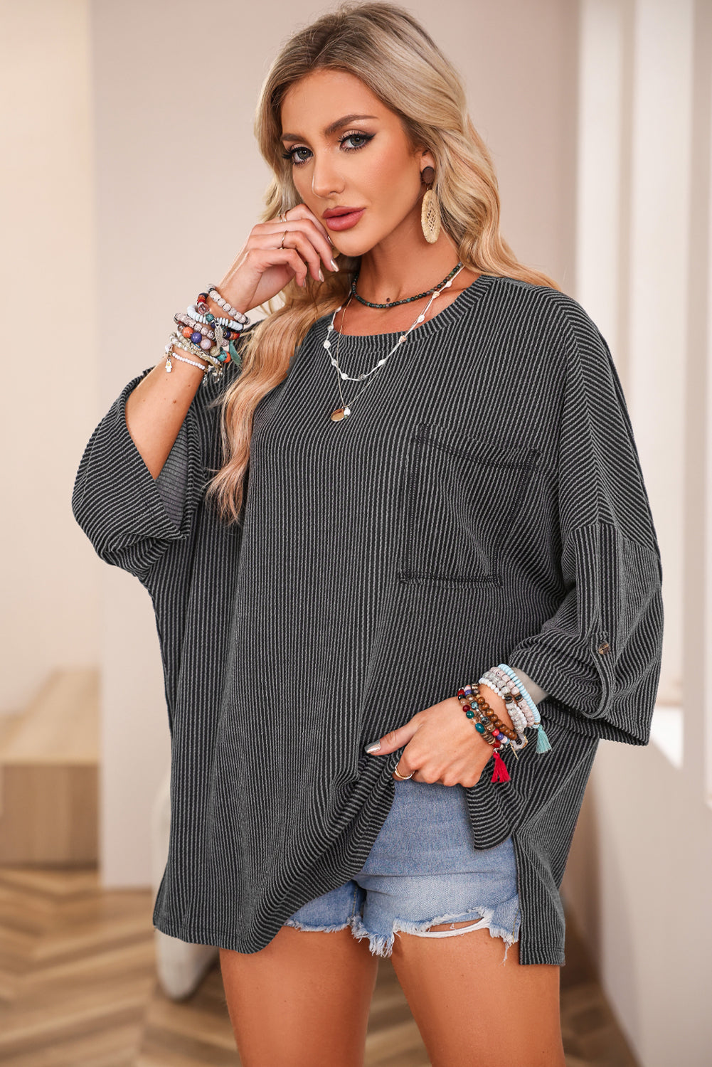 Dark grey ribbed oversized top with rolled up sleeves and chest pocket