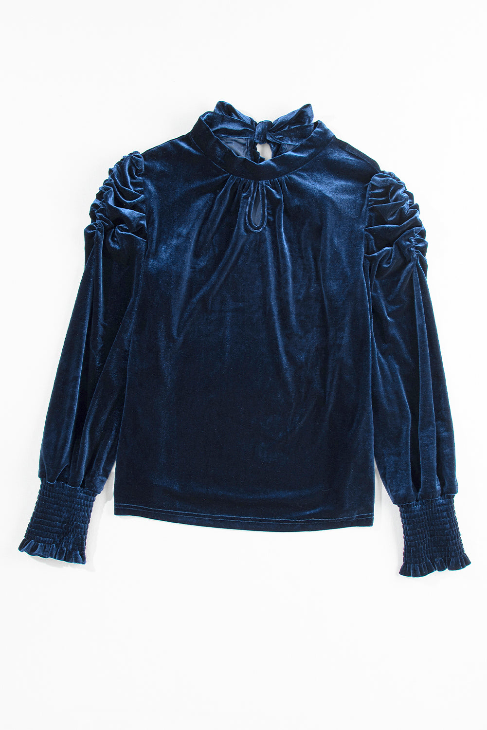 Blouse en velours bleu marine à col montant et manches bouffantes