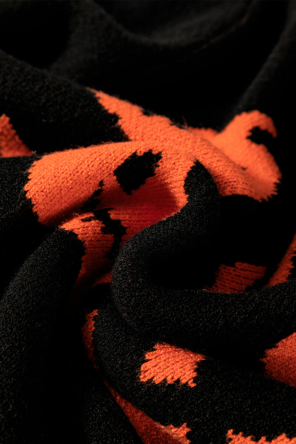 Black shoulder sweater and Halloween pumpkin face pattern