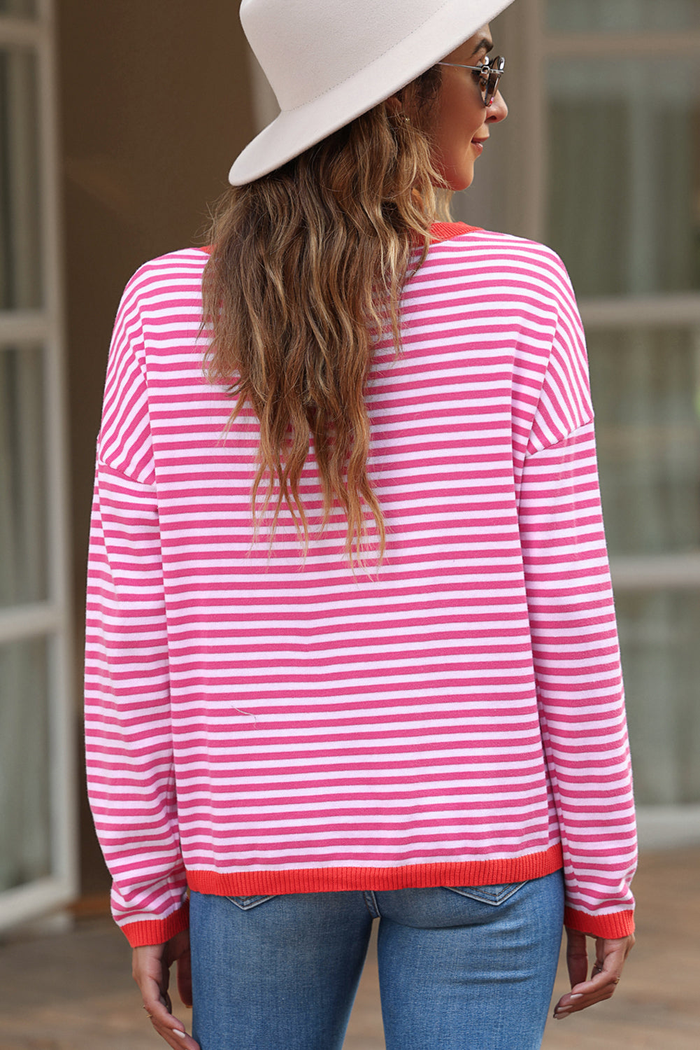 Pink drop shoulder sweater with contrasting edge stripes