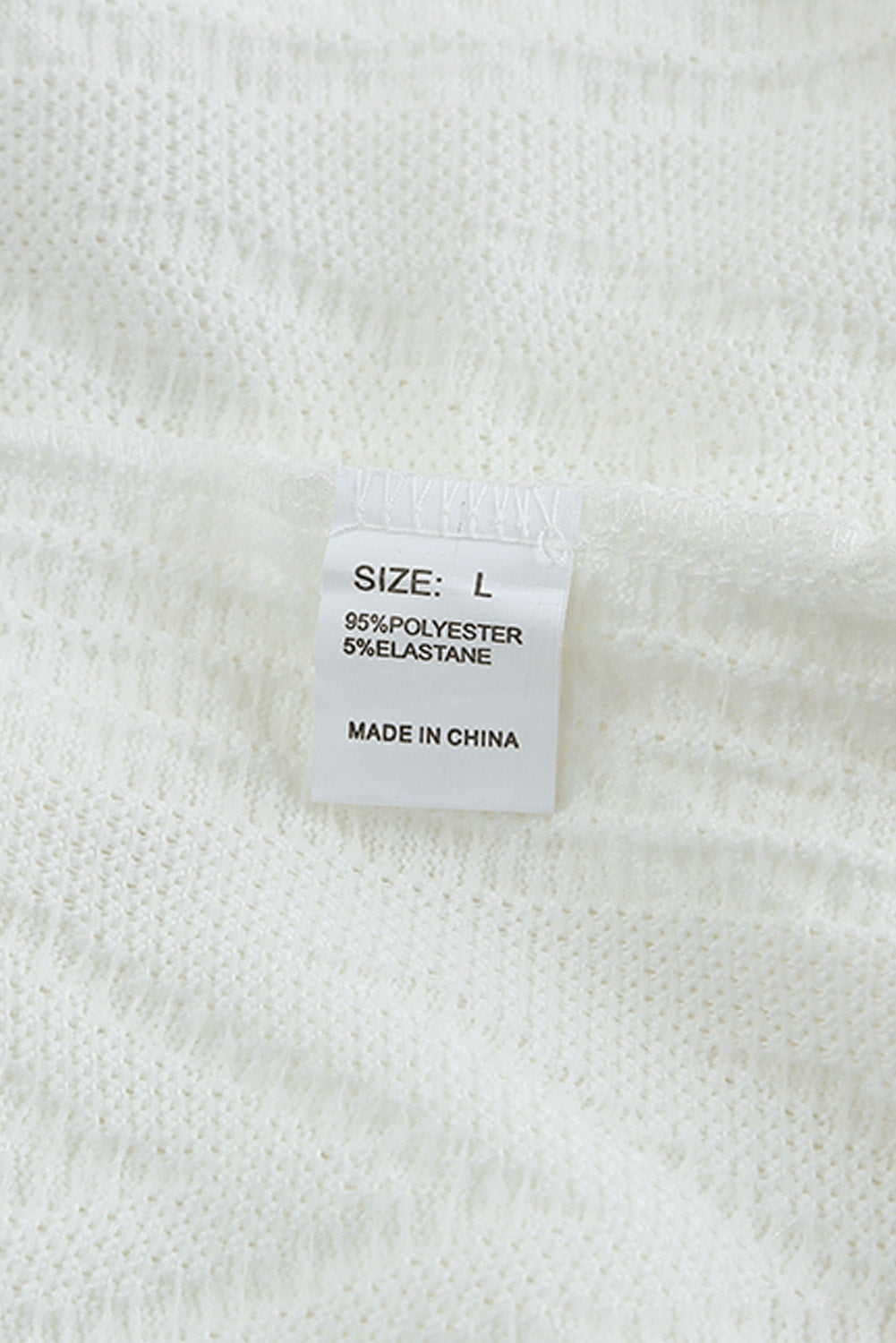 Sweat texturé au cou de cou de couche blanc