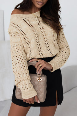 Khaki sweater with twisted knitted knitting with drooping shoulders