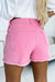 Solid color pink distressed denim shorts