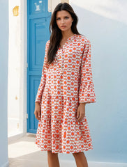 Orange floral print mini dress with ruffle sleeves and button front