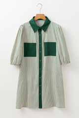 Green dress with plated and buttoned pockets *