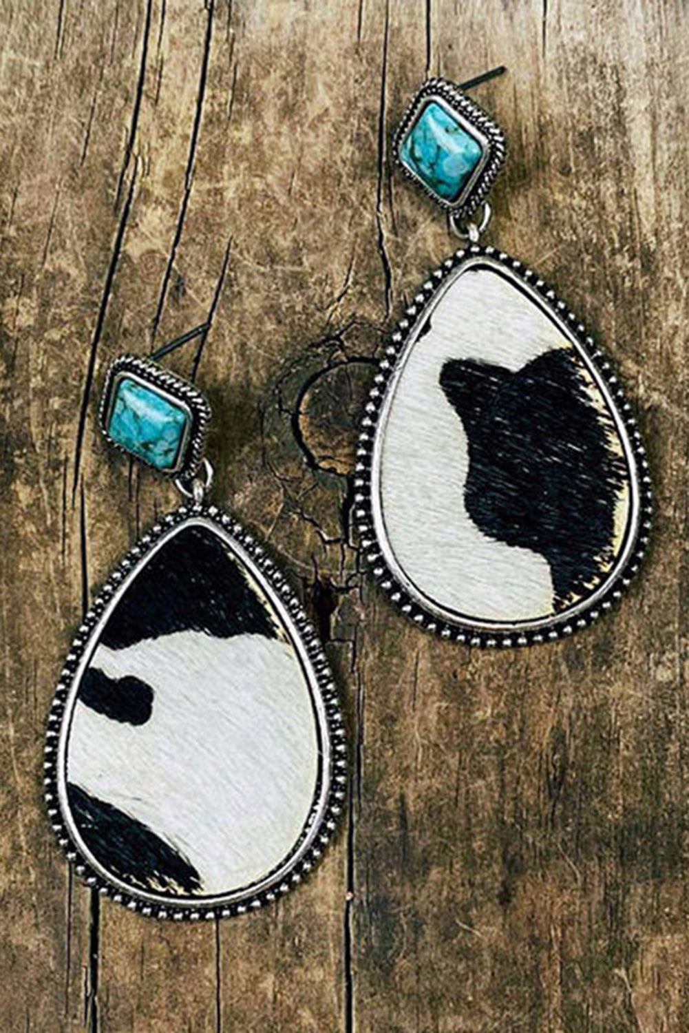 Boucles d'oreilles pendantes turquoise à imprimé vache noire