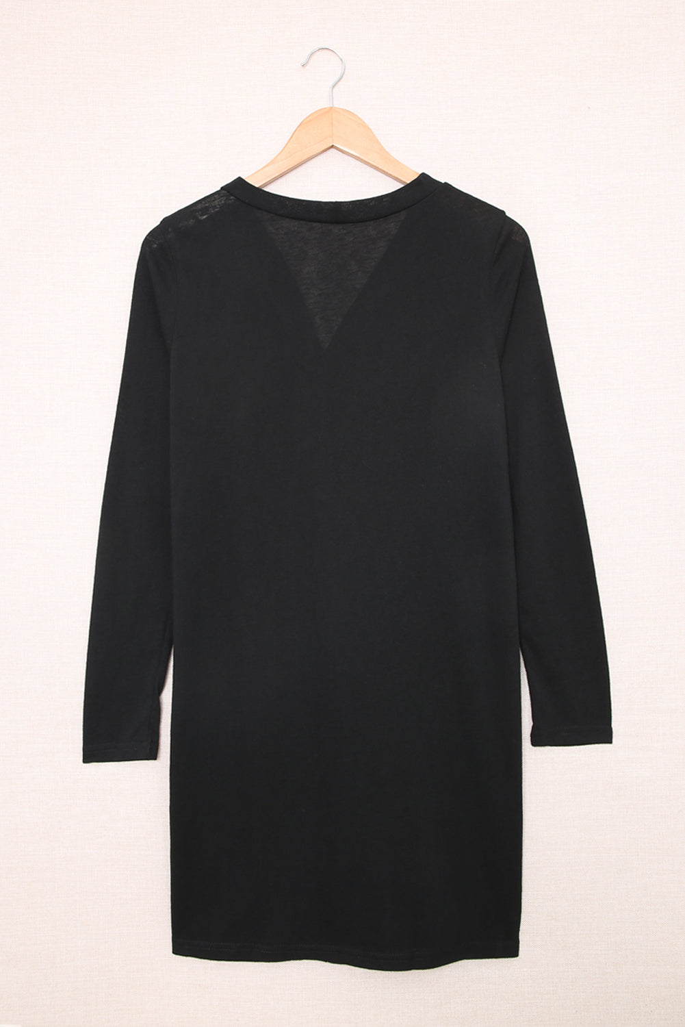 Black open button cardigan in solid color