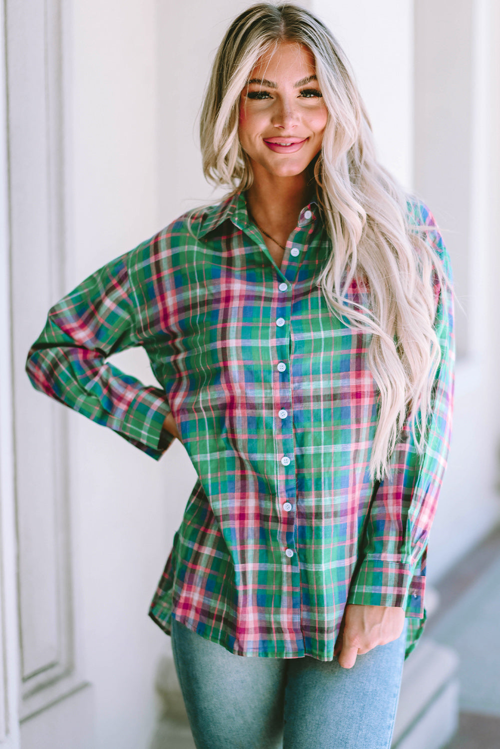 Long sleeve buttoned shirt and green tiles