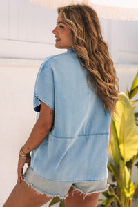 Over-dimensioned denim blouse *