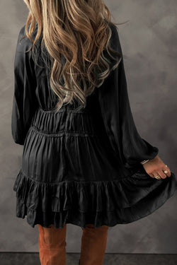 Black mini-ruffle with ruffles and puffy sleeves, loose cut