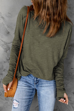 Solid green top with long sleeves and round neck