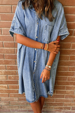 Light blue chambray shirt dress with short sleeves and medium washing