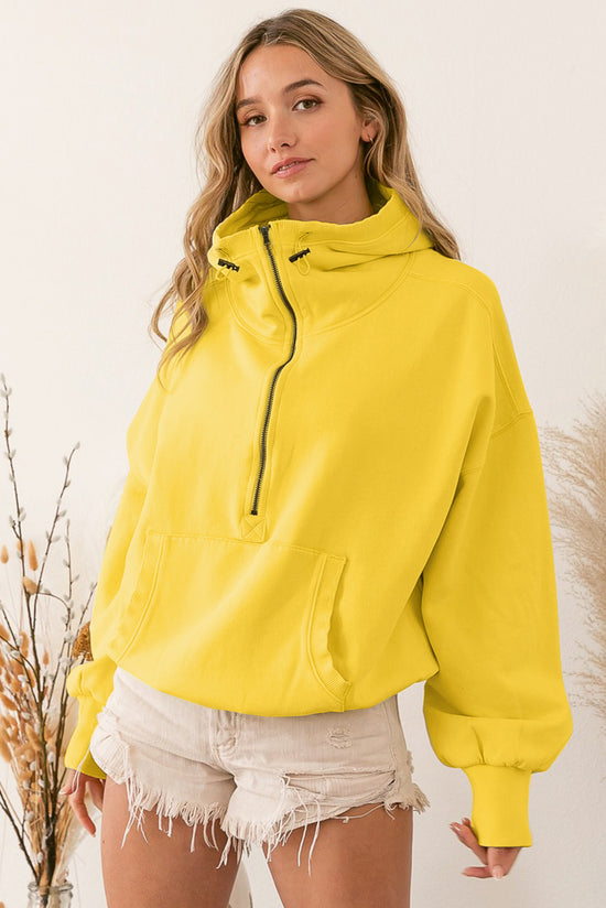 Sweat à capuche zippé jaune avec poche kangourou et bordure côtelée