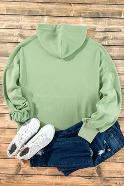 Loose fitting half zip hoodie with kangaroo pockets lined with smoke green fleece