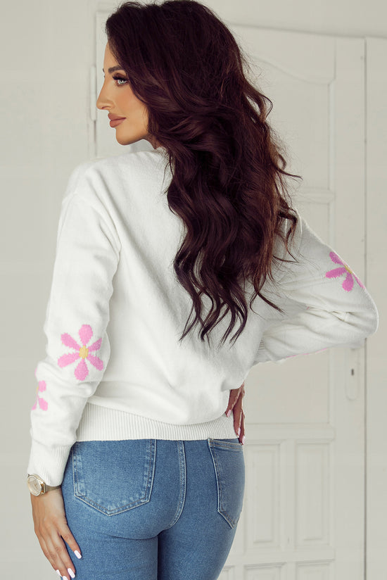 Elegant ribbed sweater with white flower pattern