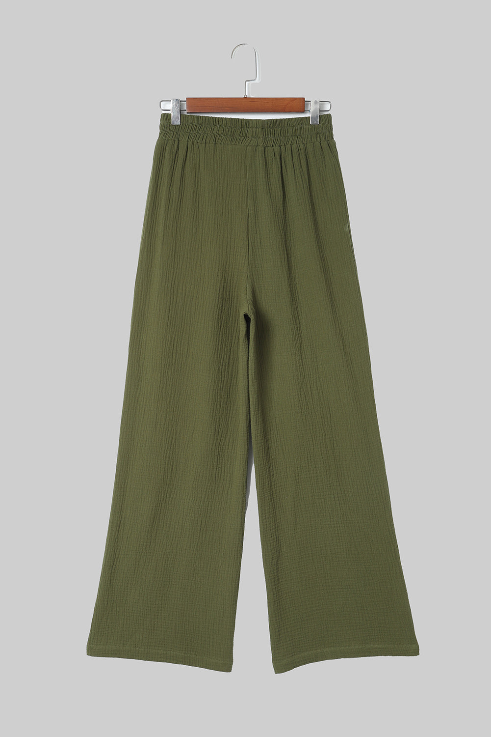 Pantalones anchos con textura arrugada verdes