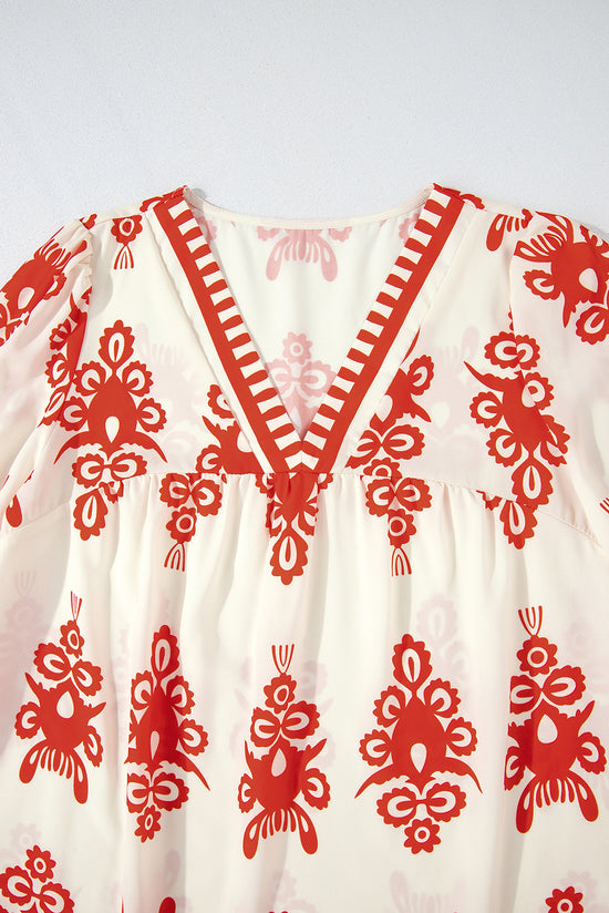 Orange blouse with geometric print*