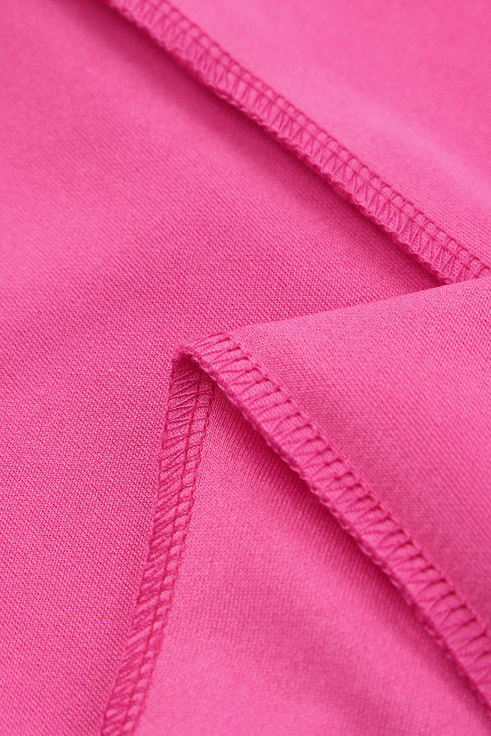 Pantalon taille haute rose à ourlet fendu