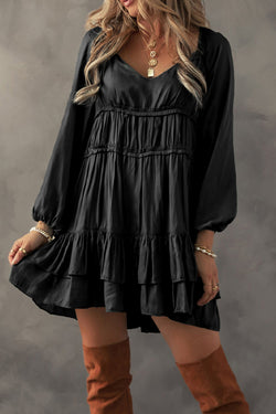 Black mini-ruffle with ruffles and puffy sleeves, loose cut