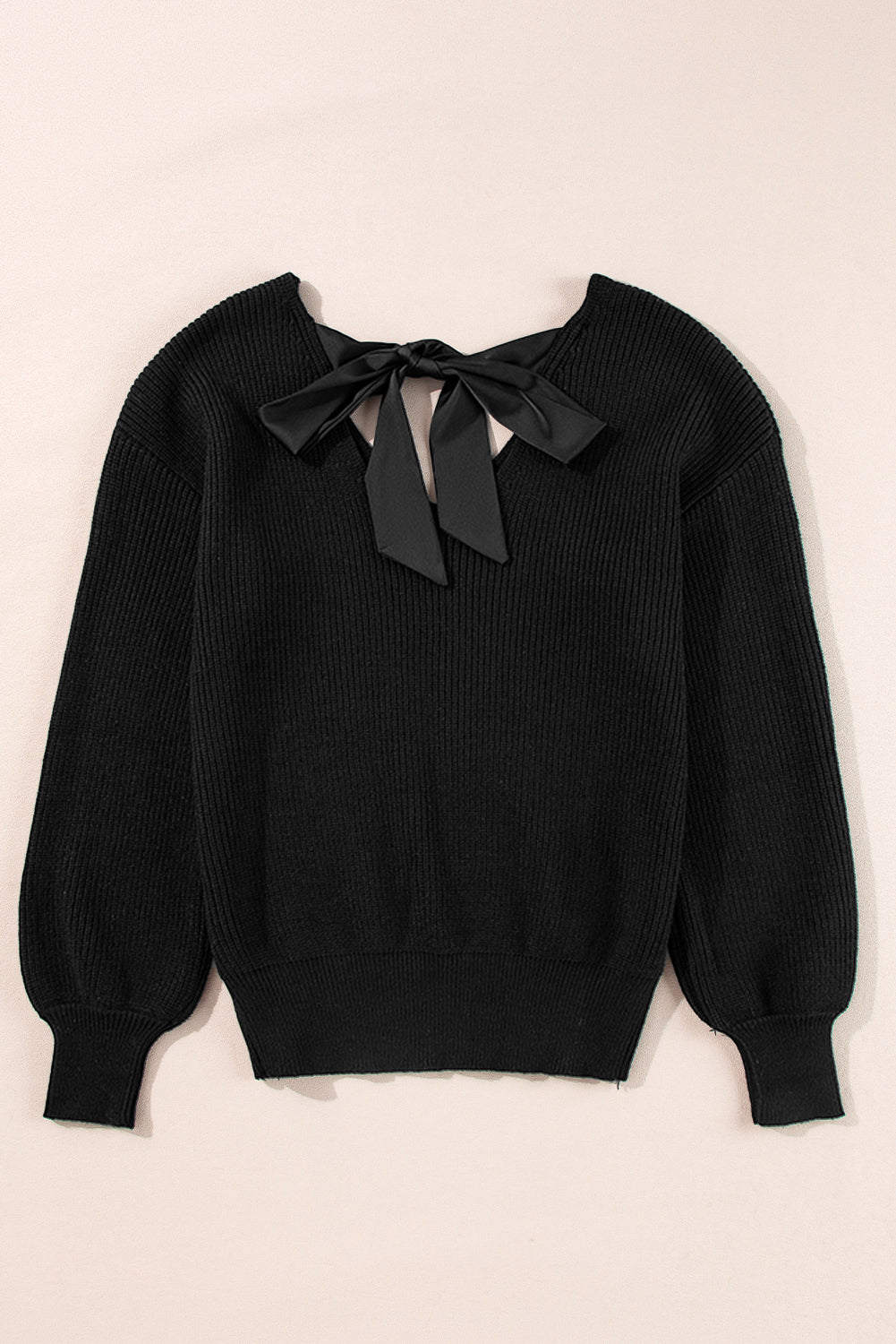 Black sweater with lantern sleeves, V-neck, knot at the back