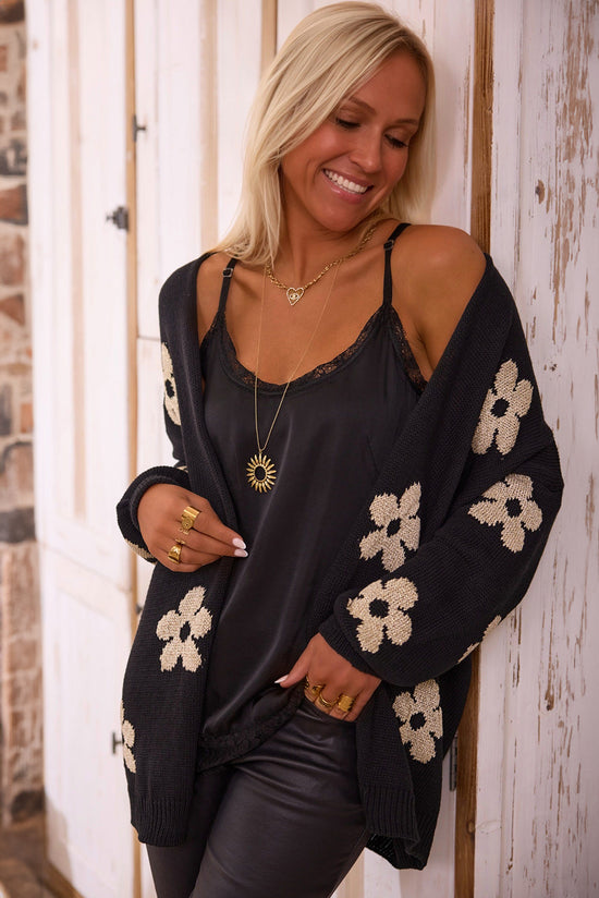 Black knitted cardigan with floral print *