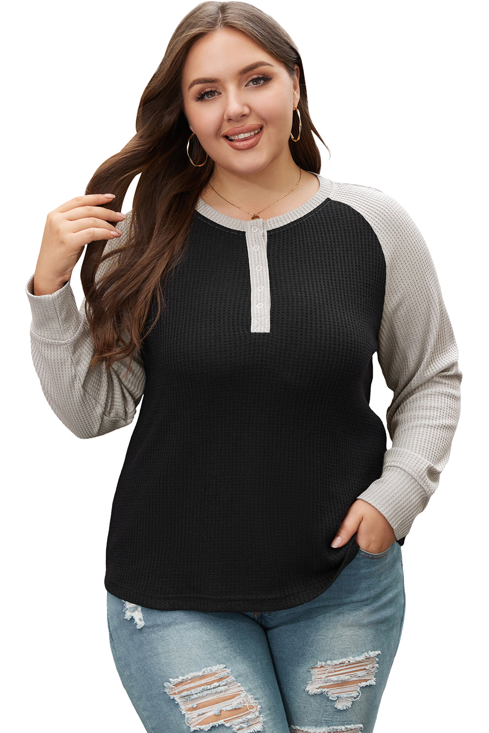Large large size button in black contrasting knitting