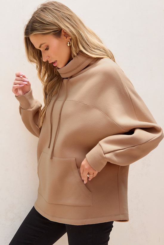 Light beige turtleneck sweatshirt with dolman sleeves and drawstring