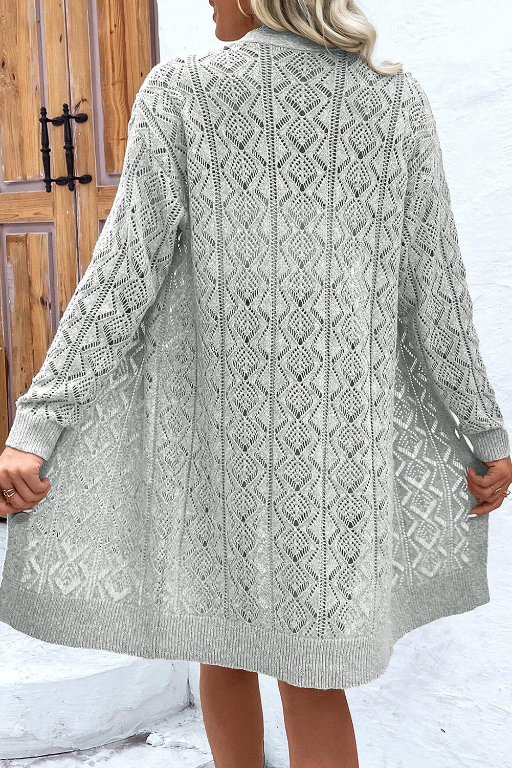 Long gray cardigan with openwork buttons on the front