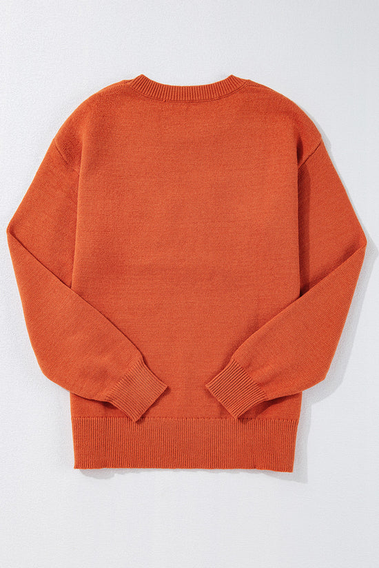 Knitted sweater with ribbed edges and drooping shoulders