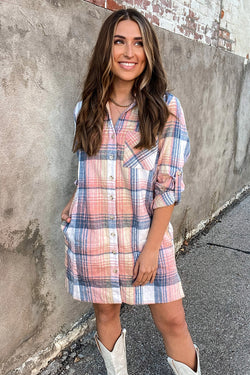 Pink plaid shirt dress with rolled up sleeves and side slit