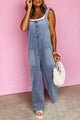 Large overalls in a washed-out denim blue stone with half-boutons and pocket pocket