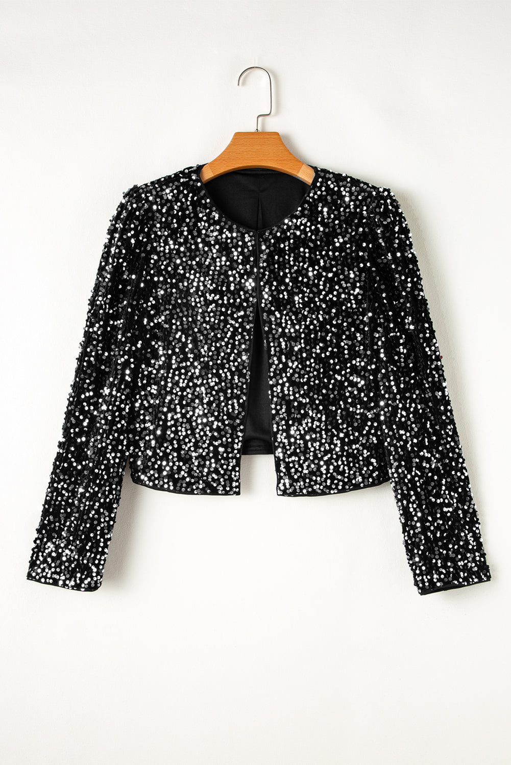 Short black jacket with sequins open on the front
