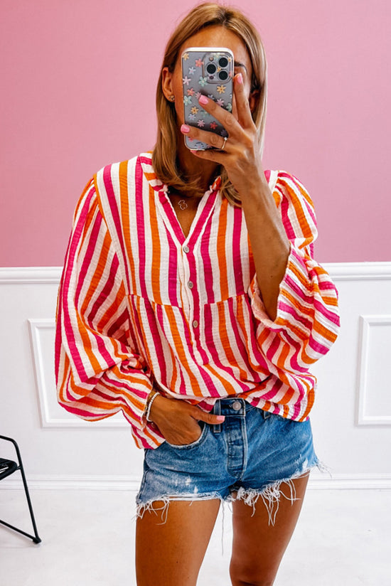 Orange striped blouse, balloon sleeves, notched v collar, buttoned on the front