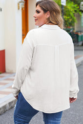 Large white textured buttoned shirt