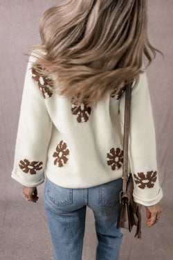 White round-neck sweater with color block floral pattern