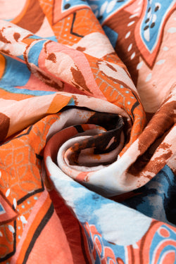 Large shirt buttoned with frowned and orange floral print