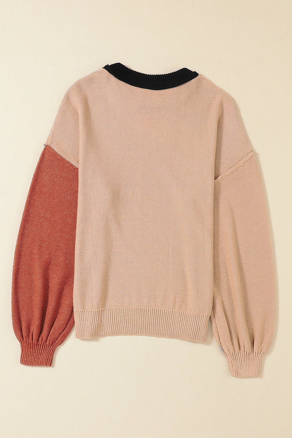 Black sweater with ribbed edge and COLOR BLOCK bishop sleeves
