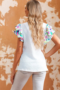 White textured high with puffy sleeves *