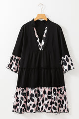 Robe courbée noire à volants et col fendu en patchwork léopard