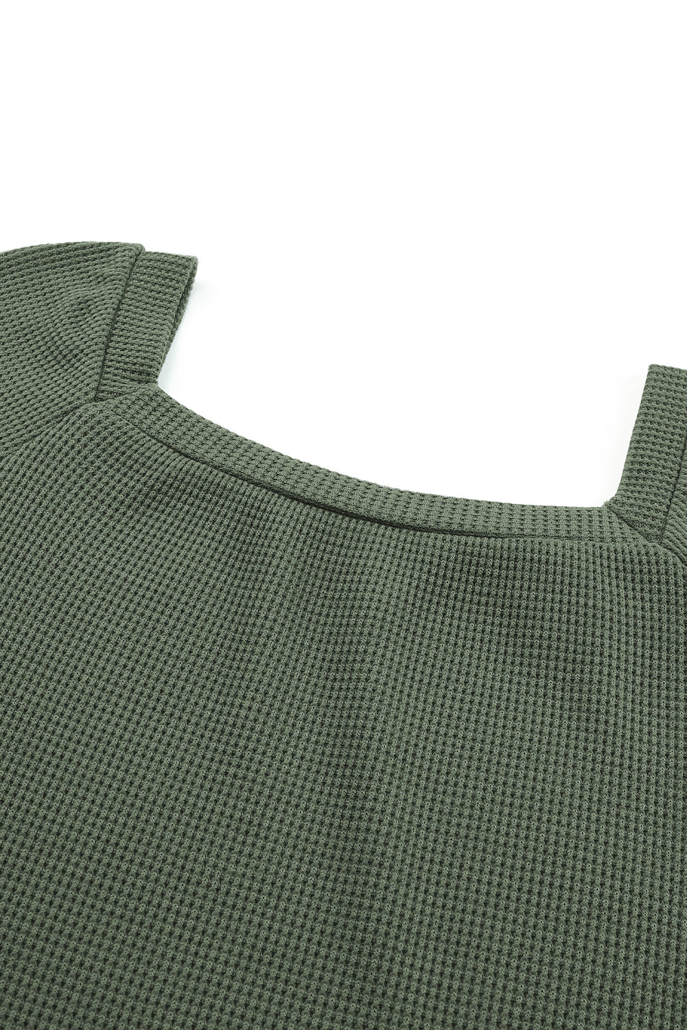 Haut en tricot gaufré vert à col rond et manches bouffantes