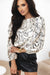 Beige blouse with round neck and abstract print balloon sleeves