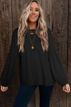 Black long puff sleeve top in faux knit jacquard