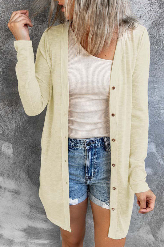 Cardigan beige à boutons ouverts de couleur unie