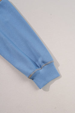 Sky blue baggy sweatshirt with color block sleeves and ribbed details