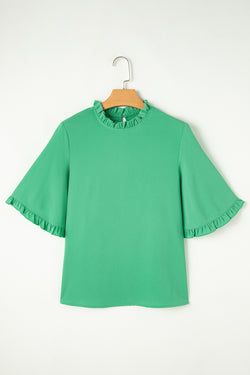 Green blouse with ruffles, round neck *