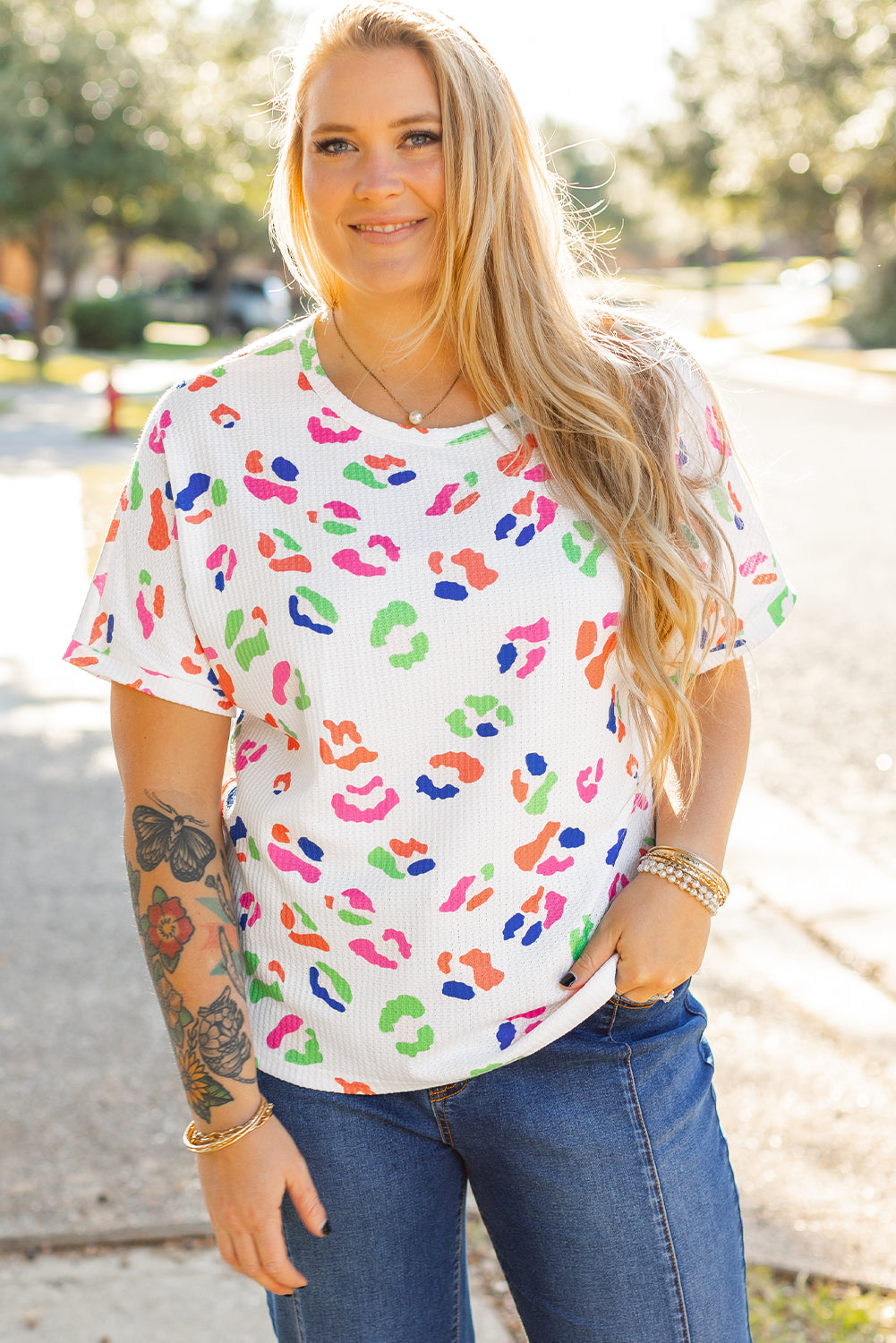 White textured t-shirt with large leopard print *