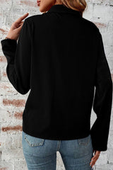 Chaqueta negra negra y manga con cremallera y aleta