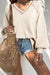 High beige sweater in textured knit *